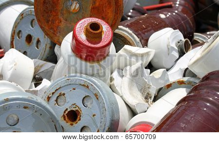 Pieces Of Iron And Ceramic Electrical Insulators