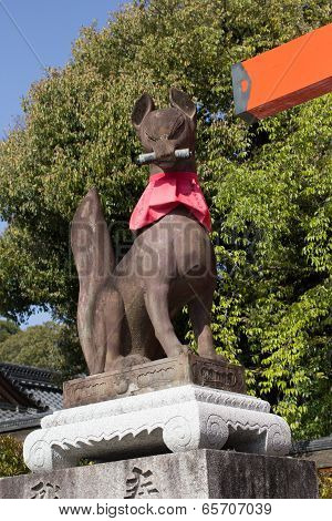Fox sculture in Fushimi Inari Taisha Shrine