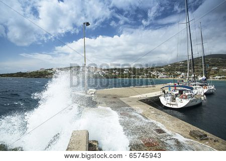 ANDROS, GREECE - APR 28, 2014: Marina of Andros, is the northernmost island of the Greek Cyclades archipelago in the Aegean Sea - area is 380 km2, 40 km long, and its greatest breadth is 16 km.
