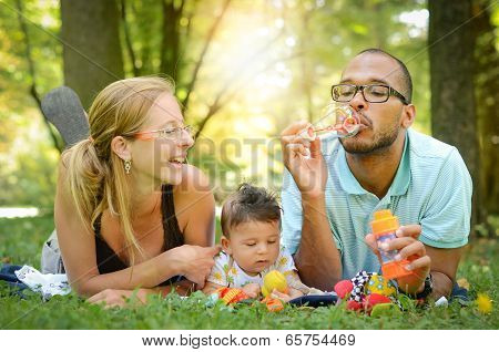 Happy Family In The Park