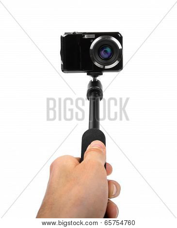 Taking Selfie - Hand Hold Monopod With Photo Camera