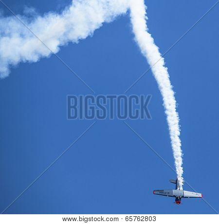 BERLIN, GERMANY - MAY 20, 2014: The aircraft Red Bull Noorduyn AT-16 D-FHGK demonstration during the International Aerospace Exhibition ILA Berlin Air Show-2014.