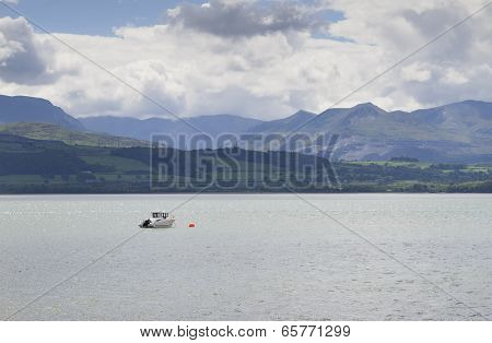 Single boat moored near Beaumaris in Anglesey