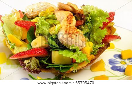 Colombian cuisine. Chicken salad on bowl of platano.