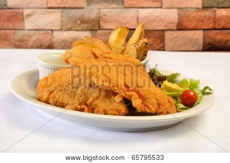 Colombian cuisine. Breaded fish.