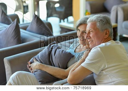 Old couple went to a resort vacation