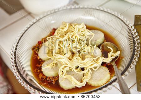 Lontong mie in Indonesian for its famous traditional food, or in English maybe spelled rice cake and noodle in vegetable soup