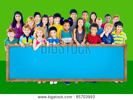 Multi-Ethnic Group of Children Holding Empty Billboard