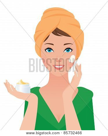 Portrait Of A Girl Uses A Cosmetic Facial Cream