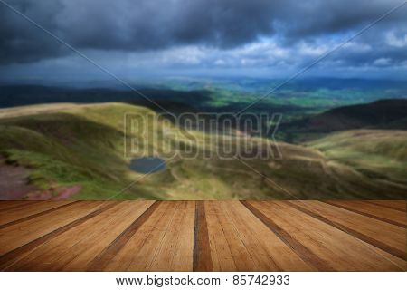 Beautiful Landscape Of Brecon Beacons National Park With Moody Sky With Wooden Planks Floor