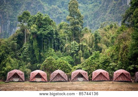 Row Of Tent In Cheow Larn Lake (ratchaprapa Dam),Thailand.