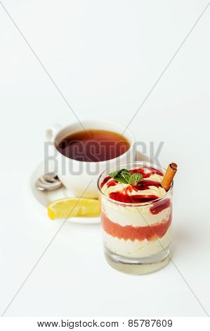 Tea With White Mousse With Milk Cream