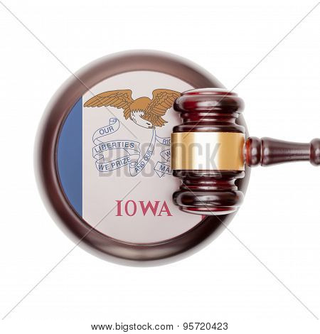 Wooden judge gavel with US state flag on sound block - Iowa