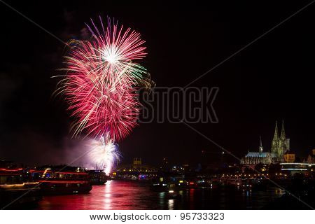 Colourful Firework In Front Of The Cathedral Of Cologne