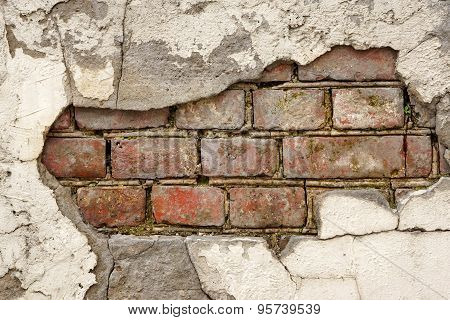 Broken Old Bricklaying From Red White Bricks And Damaged Plaster