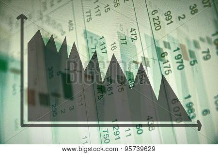 Downtrend diagram and financial data on PC screen