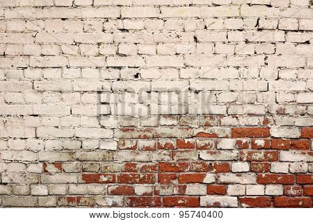 Broken Old Bricklaying From Red White Bricks And Damaged Plaster