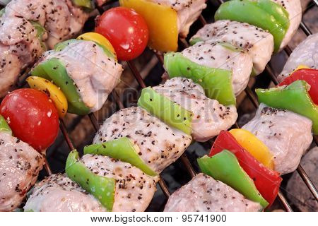 Assorted Roasted Meat With Vegetable On Barbecue Flaming Grill