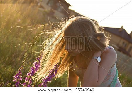 Long Hair In Sunset Light In Windy Weather