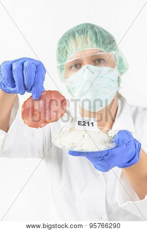 Researcher presenting preservatives substances that are added to products such as foods, pharmaceuticals, paints, biological samples, wood etc