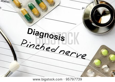 Diagnosis Pinched nerve and stethoscope.