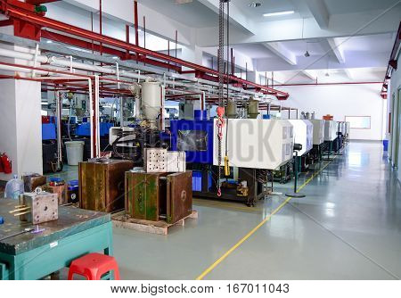 Workshop with a row of CNC machines