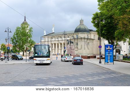 VILNIUS LITHUANIA - JULY 10 2015: Cathedral of St. Stanislaus and St. Vladislav Chapel of St. Casimir. Unidentified people walk on Cathedral Square