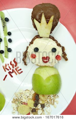 creative breakfast food with fruit and chocolate sweet cream on bread