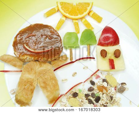 creative breakfast food with fruit and chocolate sweet cream on bread