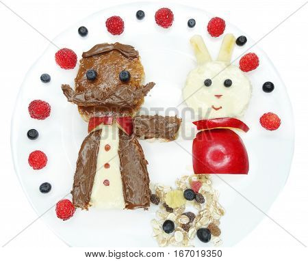 creative breakfast food with fruit and chocolate sweet cream on bread