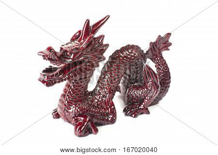 Brown traditional chinese dragon isolated on white background. Feng Shui statuette.