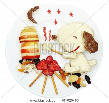 creative breakfast food with fruit and chocolate sweet cream on bread