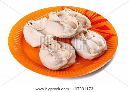 Frozen Manti Laying On The Orange Plate