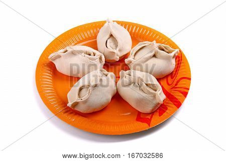 Frozen Manti Laying On The Orange Plate