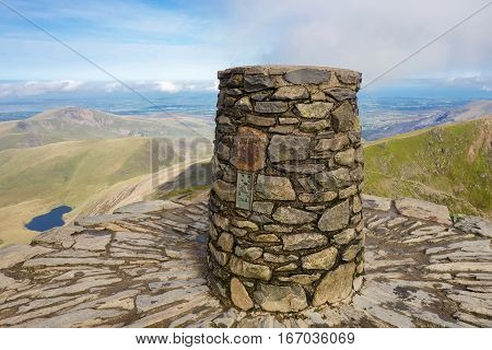 View from the top of the mountain, Snowdonia National Park, North Wales, United Kingdom; view of the mountains and the lakes, selective focus