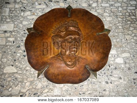 Winchester, Hampshire, England - August 02: carved wooden portrait of Queen Elizabeth in the Great Hall in Winchester Castle, now is museum of the history of on August 02, 2015 in Winchester, Hampshire, England