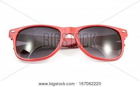 Beautiful  red sunglasses on white background .