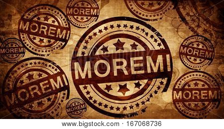 Moremi, vintage stamp on paper background