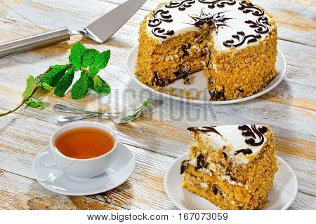 Portion Of Sponge Prune Cake Decorated With Chocolate Glaze