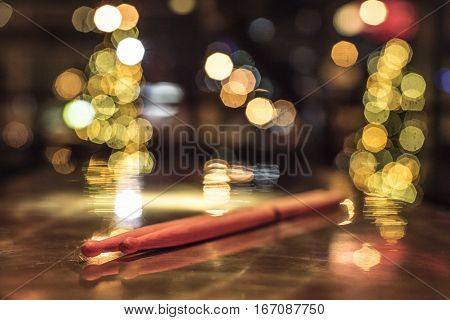 Drumsticks On A Gold Table