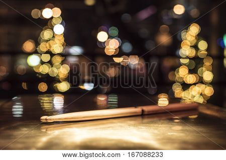 Drumsticks On A Gold Table