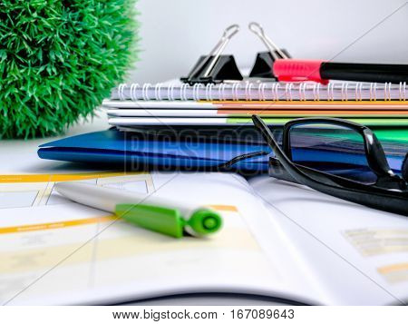 Financial report, analysis, graphs and tables on the working table
