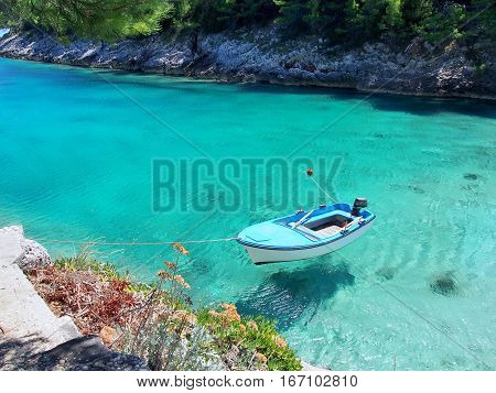 Beautiful view of the boat on the blue, clear sea