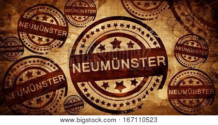 Neumunster, vintage stamp on paper background