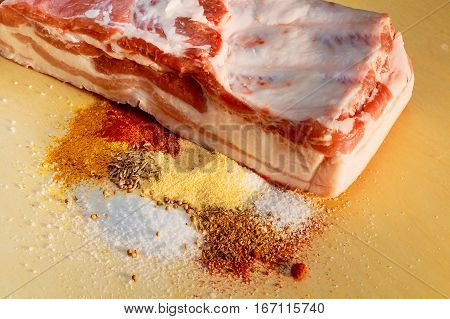 Bacon. Raw Bacon Parsley Herb Salt Pepper And Garlic.stll Life Studio Shot.