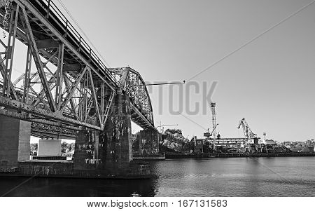 The bridge and the crane on the river.
