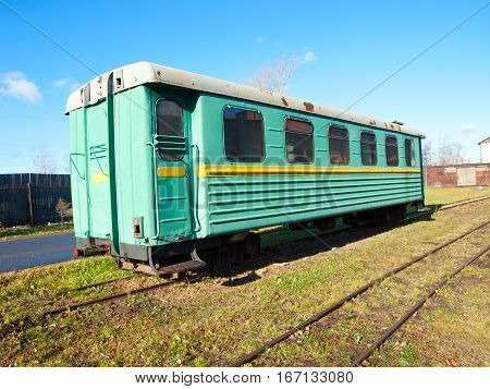 Green narrow-gauge railway wagon . . .