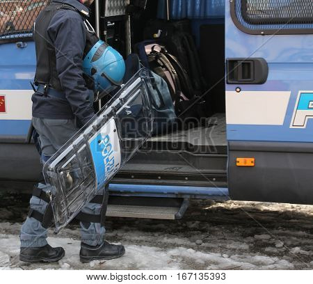 Vicenza, Vi, Italy - January 28, 2017: Italian Police Riot Squad With Blue Helmet While Patrolling T