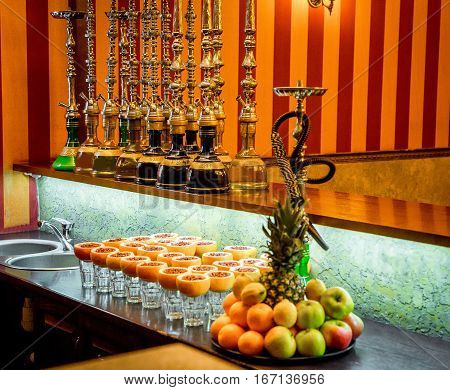 flavored hookah tobacco and fruit, a bowl of grapefruit