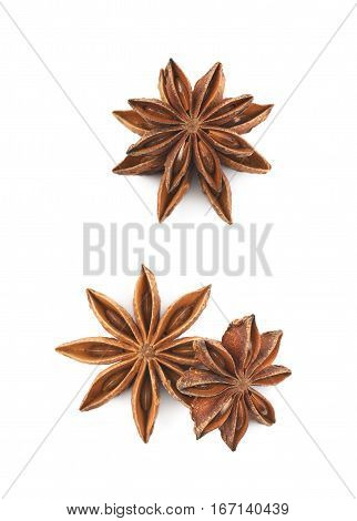 Pile of multiple Chinese star anise seeds, composition isolated over the white background, set of two different foreshortenings